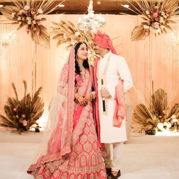 bride-groom-are-standing-front-chandelier_1113980-2347