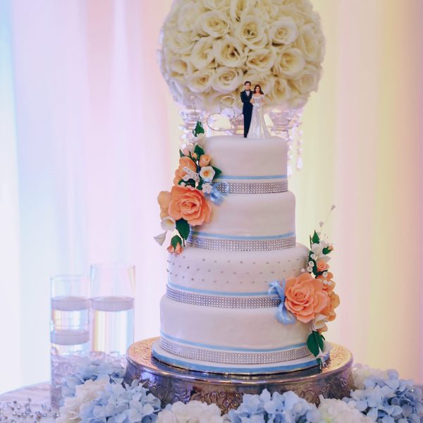 beautiful wedding cake in the restaurant is on the table